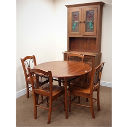  Pine dresser, two lead glazed doors above two drawers and two cupboards, plinth base (W91cm, H198cm, D44cm) and a circular beech dining table (D106cm, H74cm) and set four chairs (W43cm) (6)  