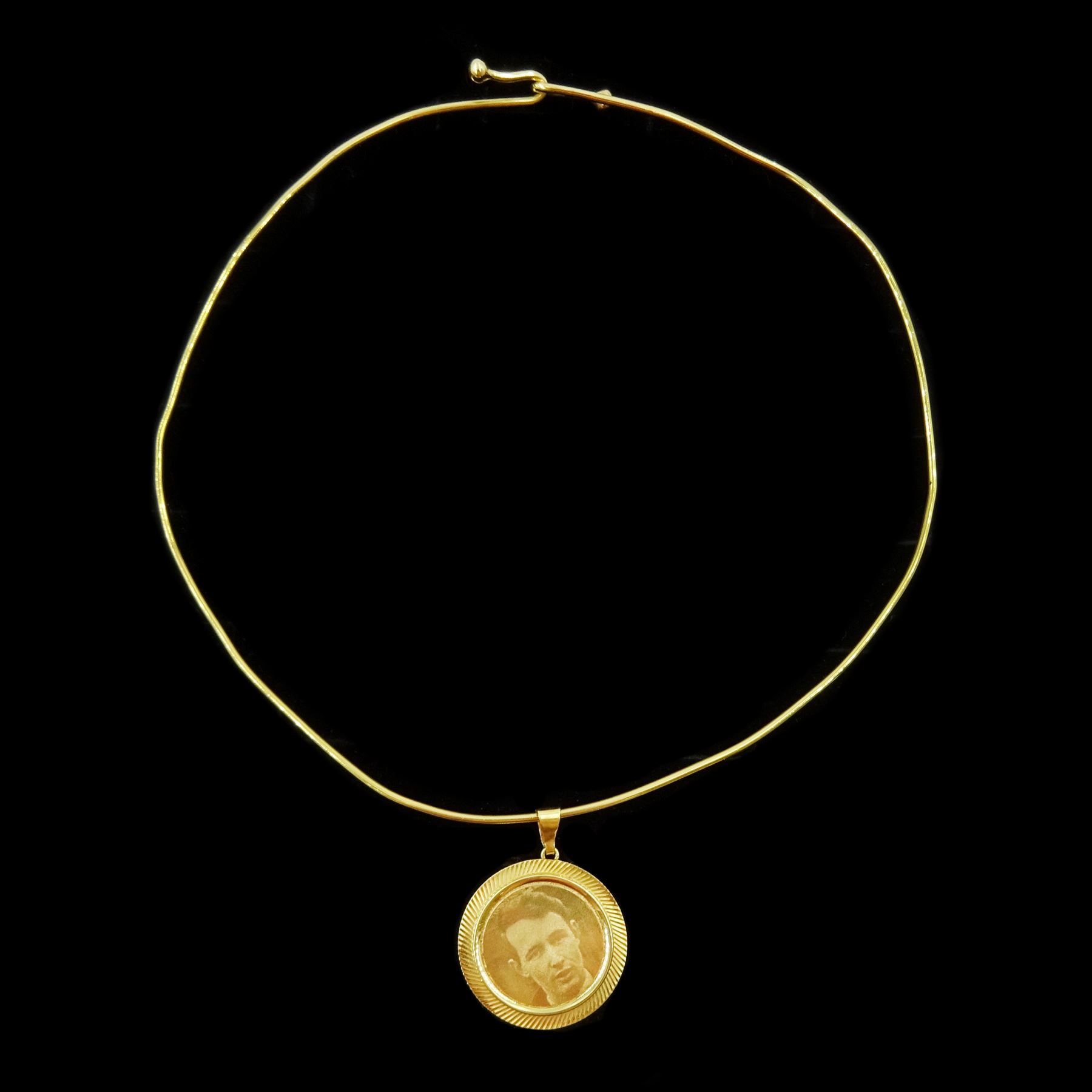 18ct gold torque necklace and photographic engraved pendant, stamped 750