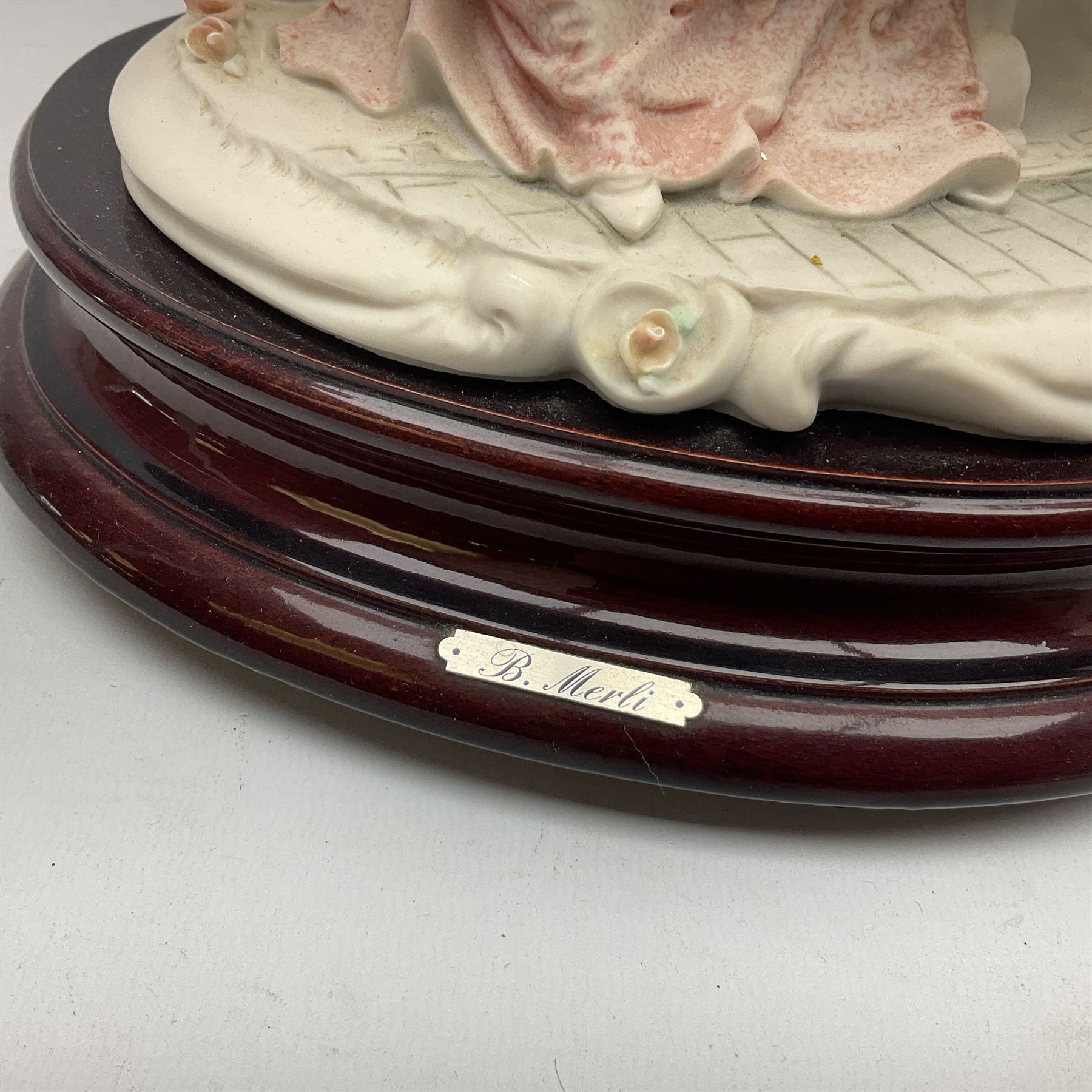 Capodimonte figural table lamp modeled as a woman and baby, signed B.Merli, with a tasseled shade, H59cm