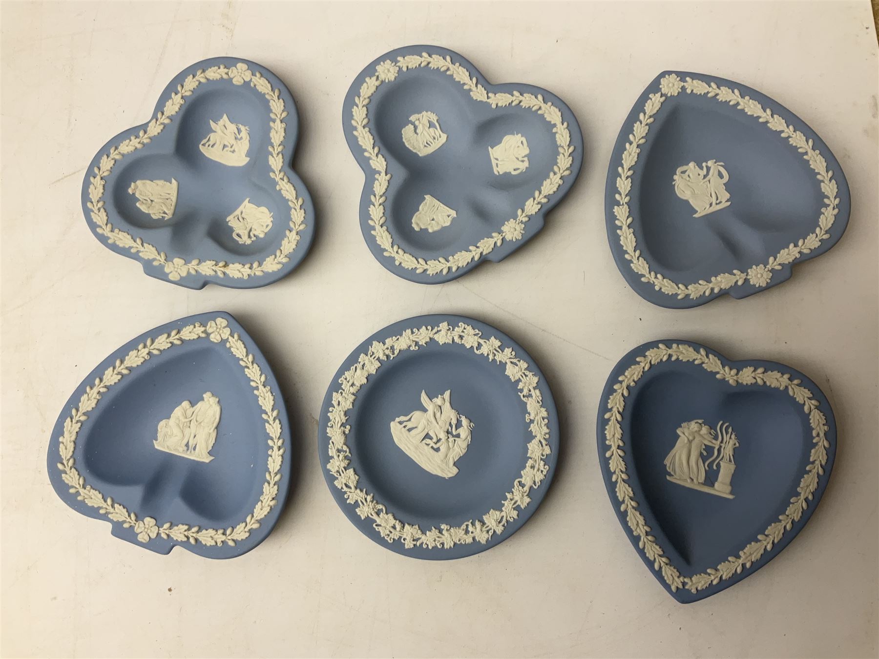 Wedgwood pale blue Jasperware, to include a pair of tulip vases, large vase with fluted rim, trinket dishes, trinket box etc, together with Wedgwood miniature hanging decoration in the form of a tea set 