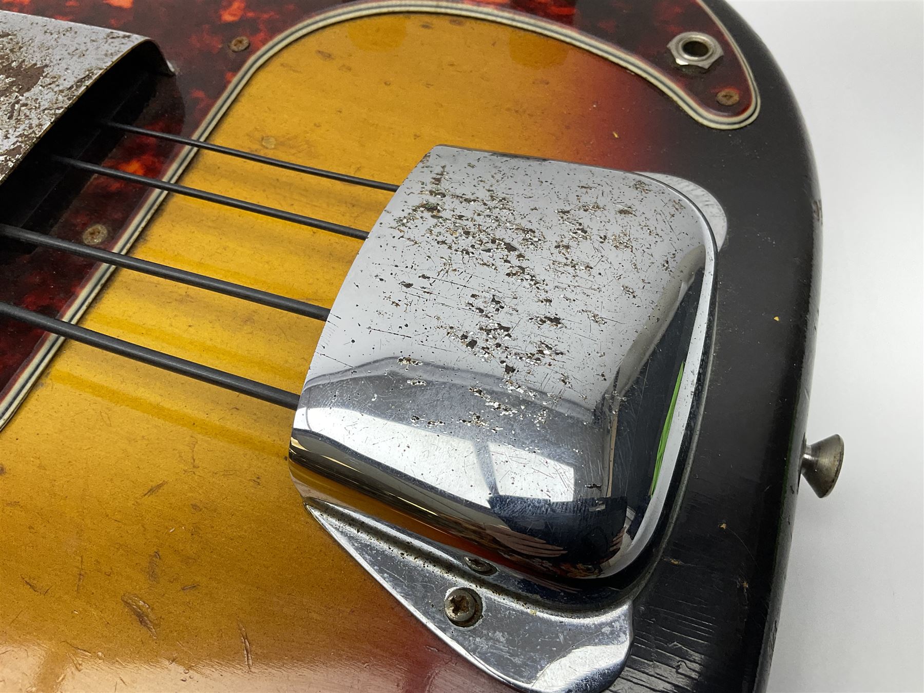 Early 1960s American Fender Precision electric bass guitar with original three-tone sunburst finish and faux tortoiseshell scratch plate; rosewood fretboard; all original fittings including chromium plated bridge and pick-up covers, finger rest, 'pots' and machines, dated on end of neck 5NOV62C, serial no.91625; L115cm overall; in Selmer simulated reptile skin covered carrying case. Sold with non-transferrable CITES A10 licence, certificate no.23GBA10CNKKEB, serial no.441200, dated 30th August 2023. Also included are original 1960s photographs of the band 'The Rascals' and photocopies of newspaper cuttings advertising their forthcoming performances along with a photocopy of a photograph of their television appearance on 'Opportunity Knocks' in 1967/8 (coming second to Mary Hopkins). In addition there is a reel-to-reel tape recording and USB stick of the band playing and two sheets of biographical information. Auctioneer's Note: The guitar was ordered by Trevor Parker from Pat Cornell's Music Shop, Spring Bank, Hull and imported from the USA in 1962, well before it was available in the UK. Trevor was the bass guitarist of The Rascals from Hull, later The Ides of March, who supported artists such as Elton John on the Hull circuit. Trevor played the guitar extensively until 1969 when The Rascals disbanded, he got married to Maureen and settled down to family life. Trevor sadly passed away in 2017, and after being in store for fifty-four years his widow has decided it is time for his guitar to be sold.