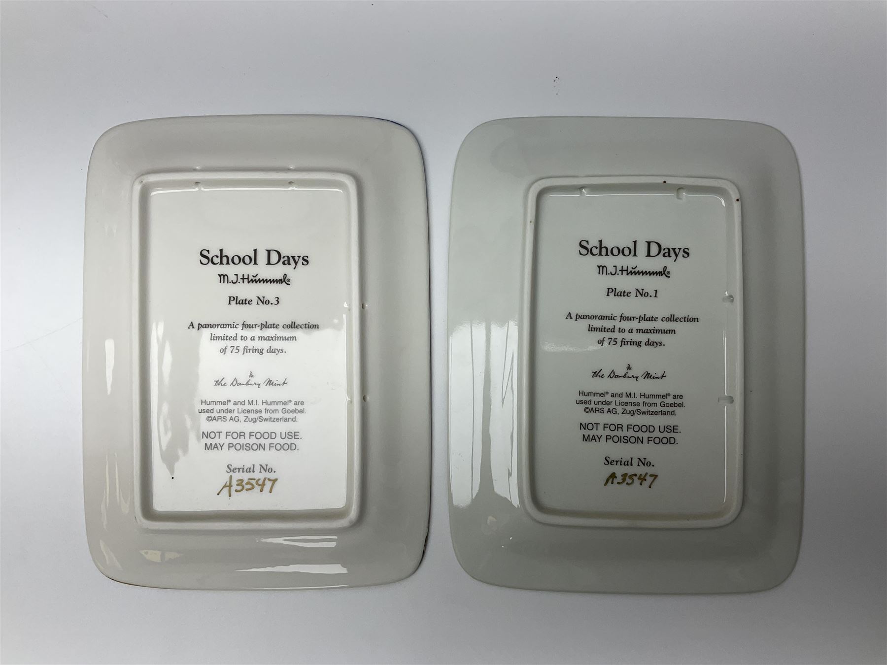 Two ceramic Hummel postcards by Goebel, both displayed on wooden easels, together nine Hummel eggs, set of four Hummel School Days plates, on wooden hanging rack, Goebel Collectors Club Member plaque etc