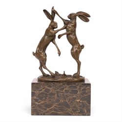 After Mario Nick - two hares boxing, bronze figure group, signed Nick and bearing foundry ...