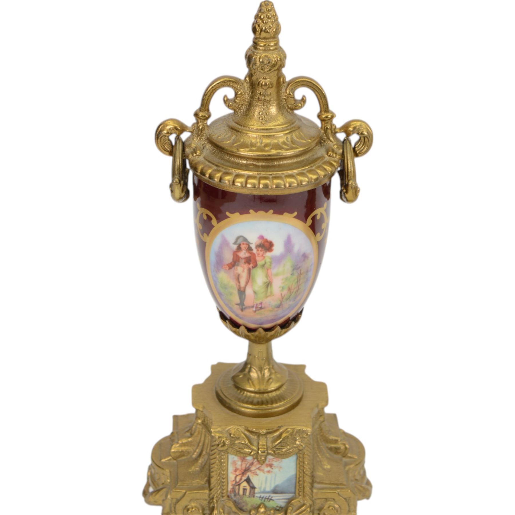 Continental-20th century clock garni in a mid 19th century style case, with porcelain panels and dial, spring driven two train movement with a floating balance escapement, striking the hours and half hours on two bells. With conforming urns. 