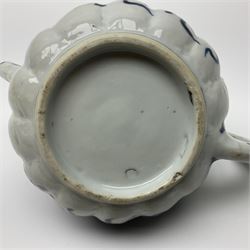 18th century Chinese blue and white teapot, painted with floral sprays, with lobed body and cover, H11cm