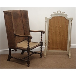  19th century oak framed wingback chair, carved arms, barely twist supports joined by stretchers (W60cm) and a white painted and gold finish firescreen (2)  
