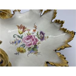 Late 19th/early 20th century Meissen porcelain fruit basket, the moulded leaf shaped bowl entwined gilt foliate handle, cobalt blue exterior and interior hand painted with floral sprays upon a white ground, with underglaze blue crossed swords mark beneath, H26cm W41cm 
