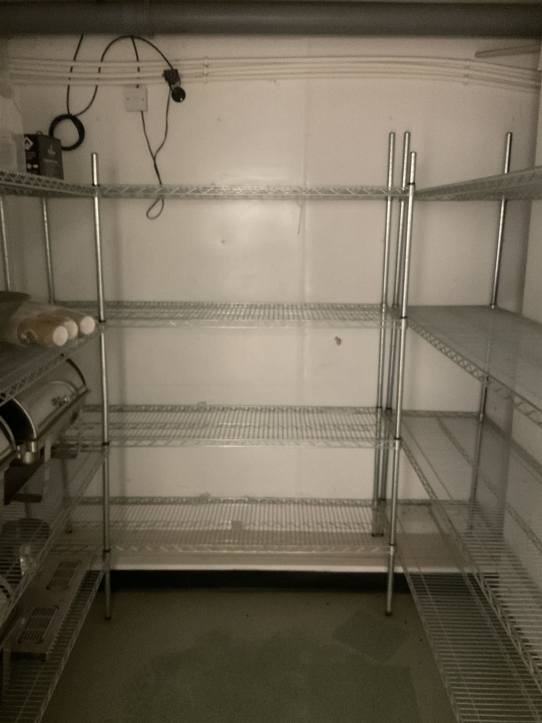 Metal four tier shelving racking x 3, plastic racking and shelving- LOT SUBJECT TO VAT ON THE HAMMER PRICE - To be collected by appointment from The Ambassador Hotel, 36-38 Esplanade, Scarborough YO11 2AY. ALL GOODS MUST BE REMOVED BY WEDNESDAY 15TH JUNE.