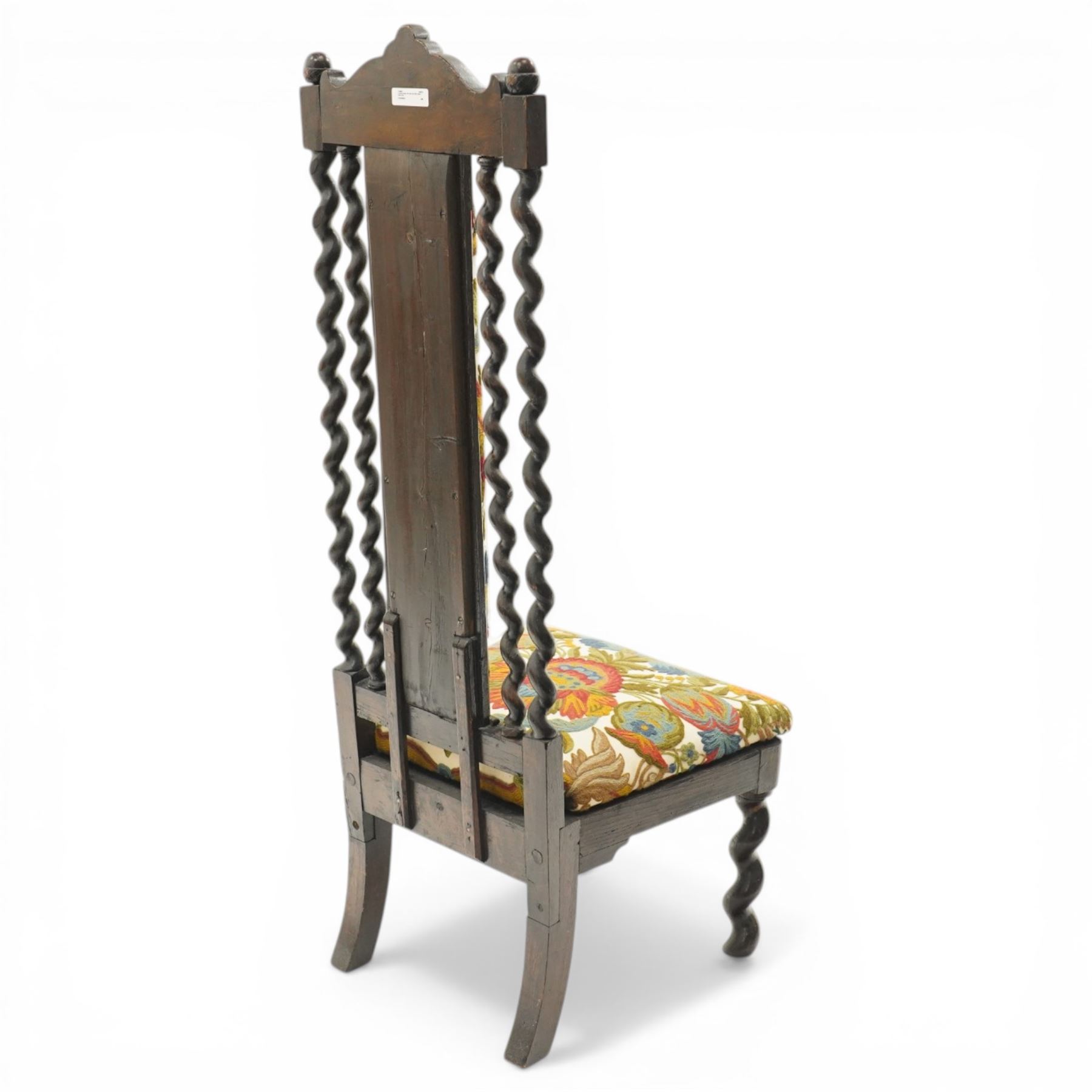 19th century Carolean design oak hall chair, carved cresting rail over barley-twist uprights, high back and loose seat upholstered in wool-work foliate tapestry (W46cm H116cm); 19th century elbow chair mahogany with spiral turned centre rail and roundel-applied frieze (W56cm H85cm)