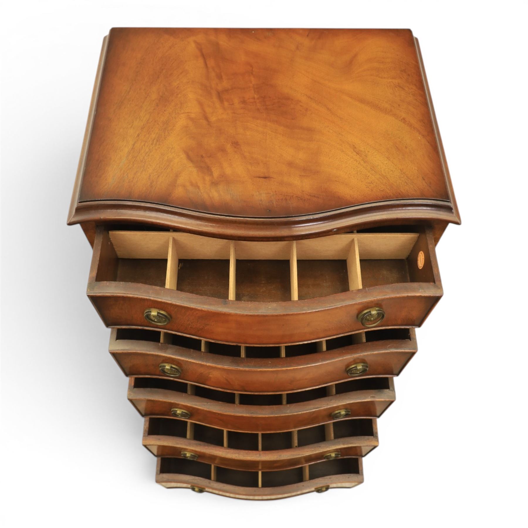Reprodux - 20th century mahogany narrow serpentine chest, with six graduating drawers, later fitted with dividers, raised on bracket feet
