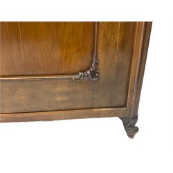 Early 20th century Italian walnut armoire wardrobe, the pierced and scrolling pediment carved with acanthus leaf detail, flanked by two scrolling cartouche with matching corbels below, the two panelled doors with applied carved rinceaux slips, with a central spiral turned upright, enclosing single shelf and hanging rail, raised on scroll feet