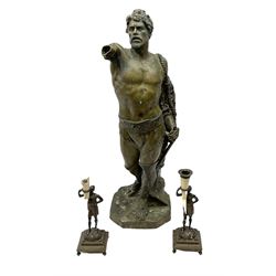 Bronzed sculpture with inscription on the canted base 'AVE CAESAR! MORITURI TE SALUTANT' together with two bronze candlesticks