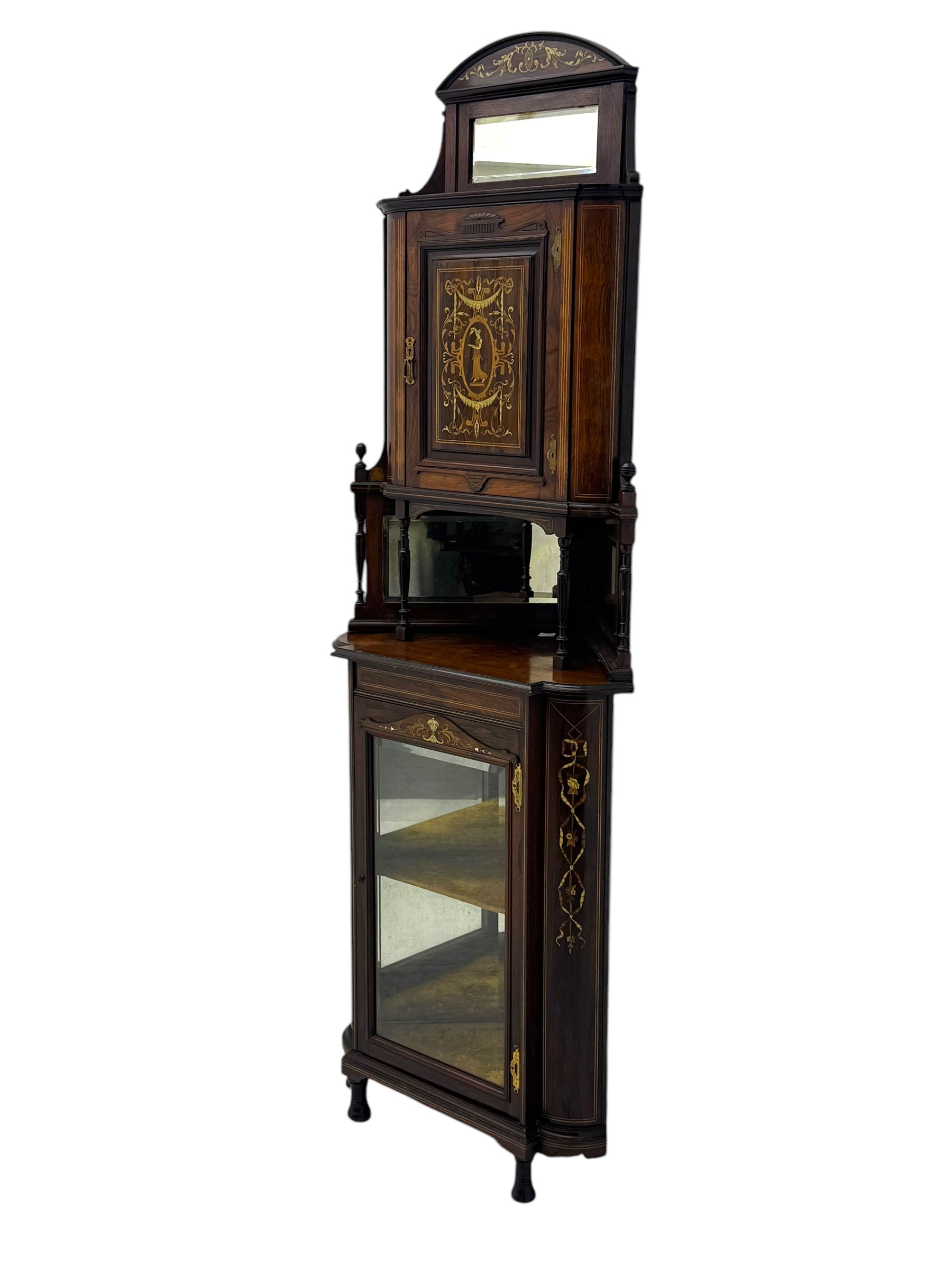 Late 19th century inlaid rosewood free standing corner display cabinet, the upper section featuring a mirrored panel above an inlaid cupboard with a felt-lined interior, complemented by a recessed open compartment with a mirrored back, the base with a glazed door enclosing two felt-lined shelves, on turned supports