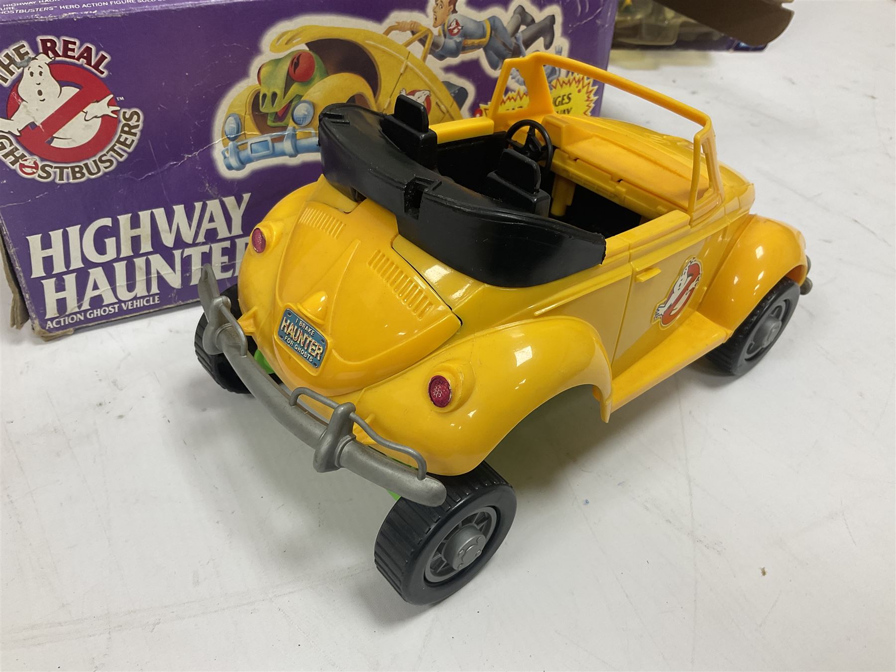 Ghostbusters - 'ECTO 1' car with two figures; ECTO-2 Vehicle, Highway Hunter Action Ghost Vehicle and Haunted Vehicles Air Sickness; all boxed; racing car with Egon Spengler driver; two 1984 Marshmallow Man figures; and four unopened carded/boxed figures etc