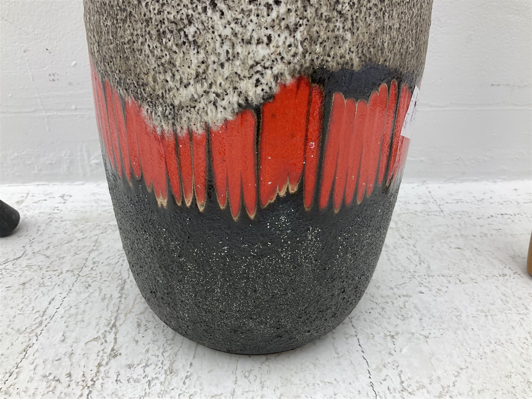 Two smooth polished ram horn handled Shepherd's crooks and a further similar example, together with various shooting sticks, walking sticks and canes, housed in a volcanic lava glaze West German style vase