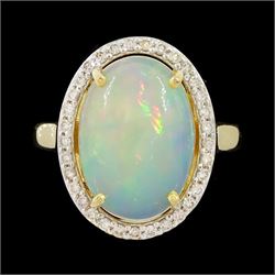 14ct gold opal and diamond cluster ring, single cabochon cut opal of approx 2.80 carat, wi...