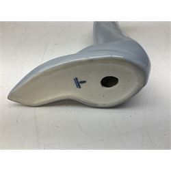 Four Lladro figures, comprising Afternoon Promenade no 7636, Nostalgia no 5071, both with original boxes, Girl with Lilies no 4972 and Madonna no 4534, largest example H27cm