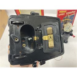 Three vintage battery operated robots comprising tin-plate Space Walk Man ME 100 Robot, Saturn the 13