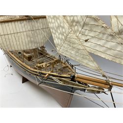 Three masted kit built sailing ship with cloth sales, deck fittings and full rigging, on open display, L110cm, H80cm  