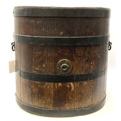 Large coopered oak open oval barrel with dished base, two side carrying handles and central brass fitting for tilting H56cm W56cm