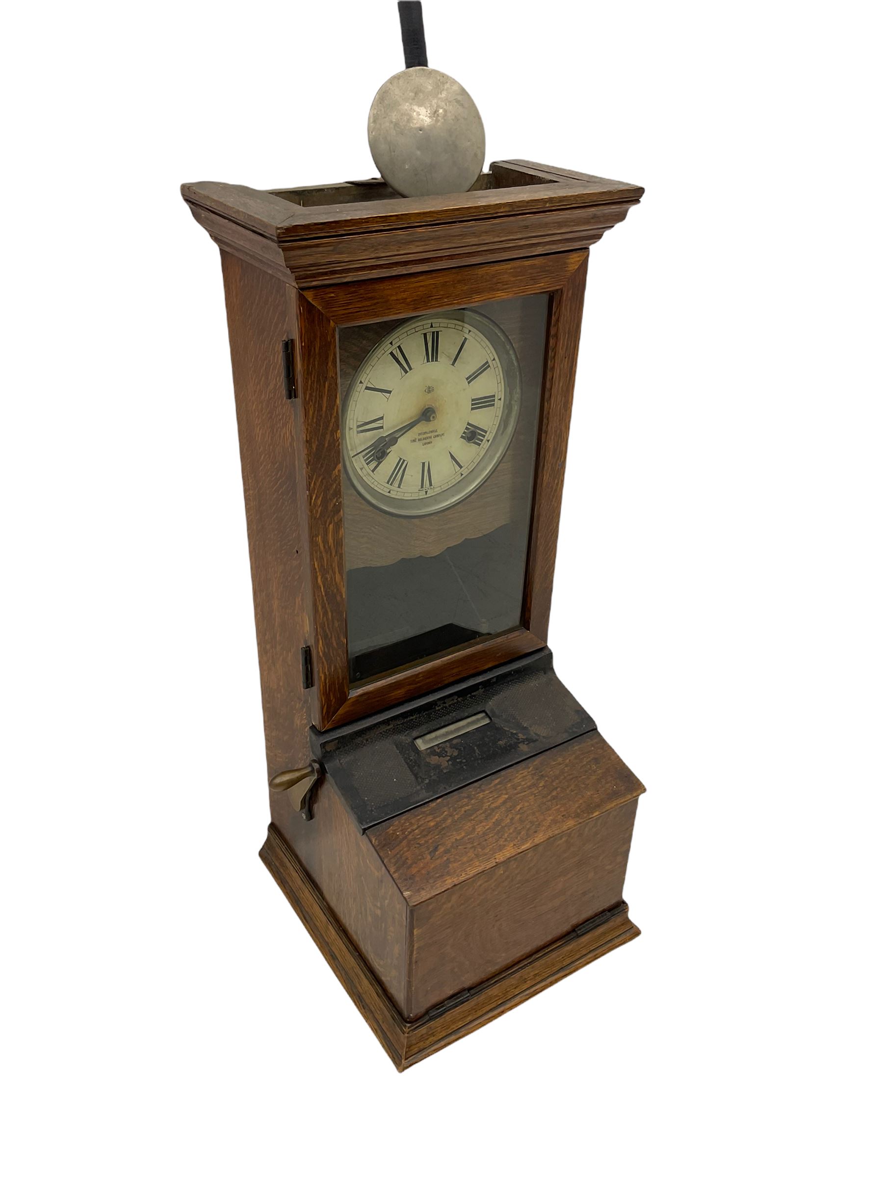 An early 20th century time recording clock (clocking in machine