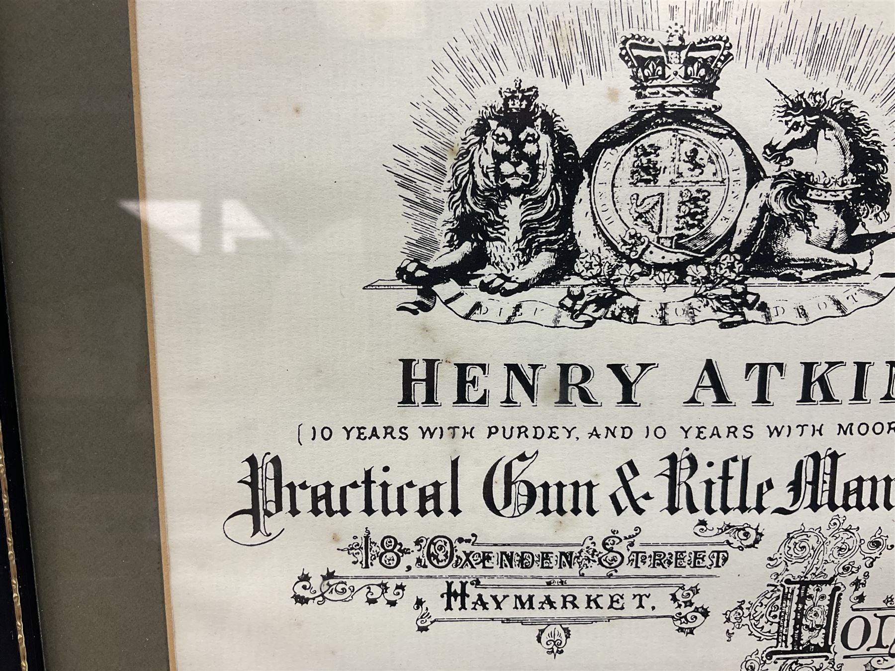 Framed display of three trade gun case labels for Joseph Lang & Son, Henry Atkin and Stephen Grant & Sons, mounted in Hogarth style frame 56 x 25cm