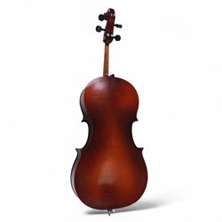 Czechoslovakian 3/4 size cello, with a one piece back, carved scroll neck with ebonised tuning pegs, fingerboard and tail piece, with strings and bridge, no bow. In a soft case.