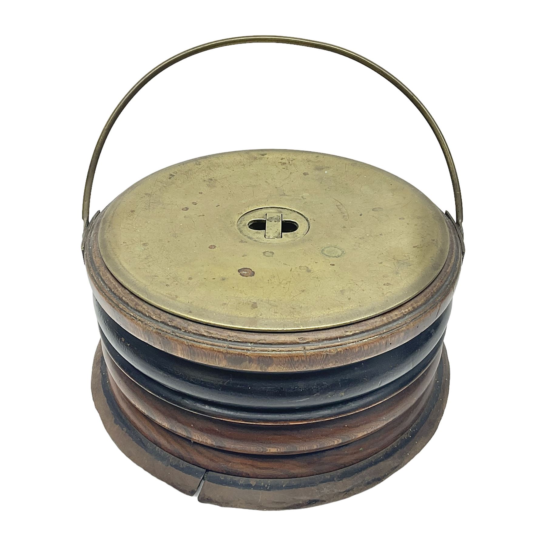  Georgian circular footwarmer with turned wood with decorative ebonised band, brass cover and swing handle, D25cm