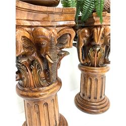 Pair of hardwood elephant carved columns