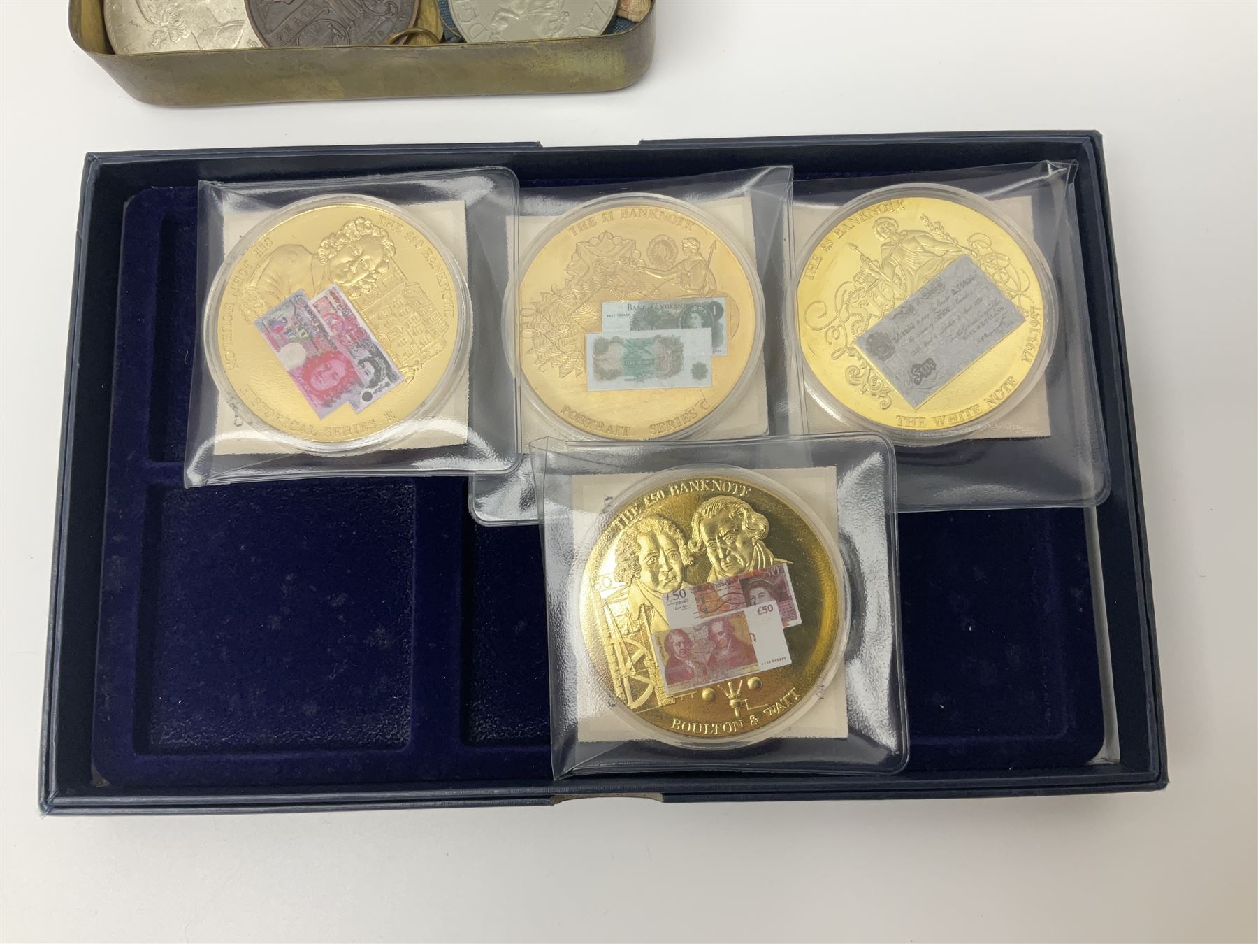 Six early 20th century fishing reels, to include wooden and brass examples, together with a leather powder flask, 1913 Christmas tin, Morgan dollar, Queen Victoria double florin and a collection of other coins, etc 