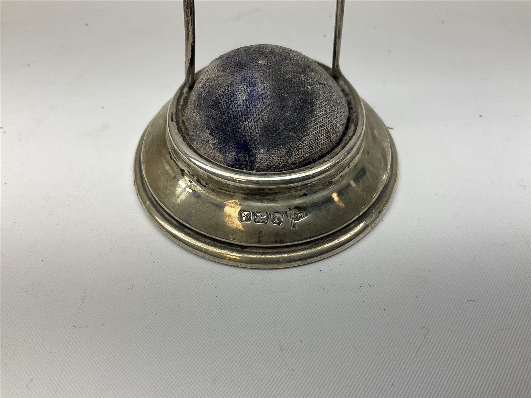 Silver hallmarked novelty pin cushion and pocket watch stand modelled as a wish bone