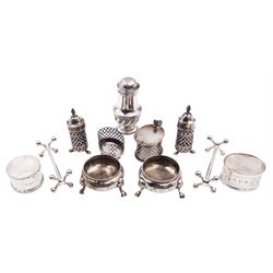 Pair of Victorian silver salts by Charles Stuart Harris, London 1870, four piece silver cruet with pierced decoration, pair of silver knife rests, pepperette and two napkin rings, all hallmarked