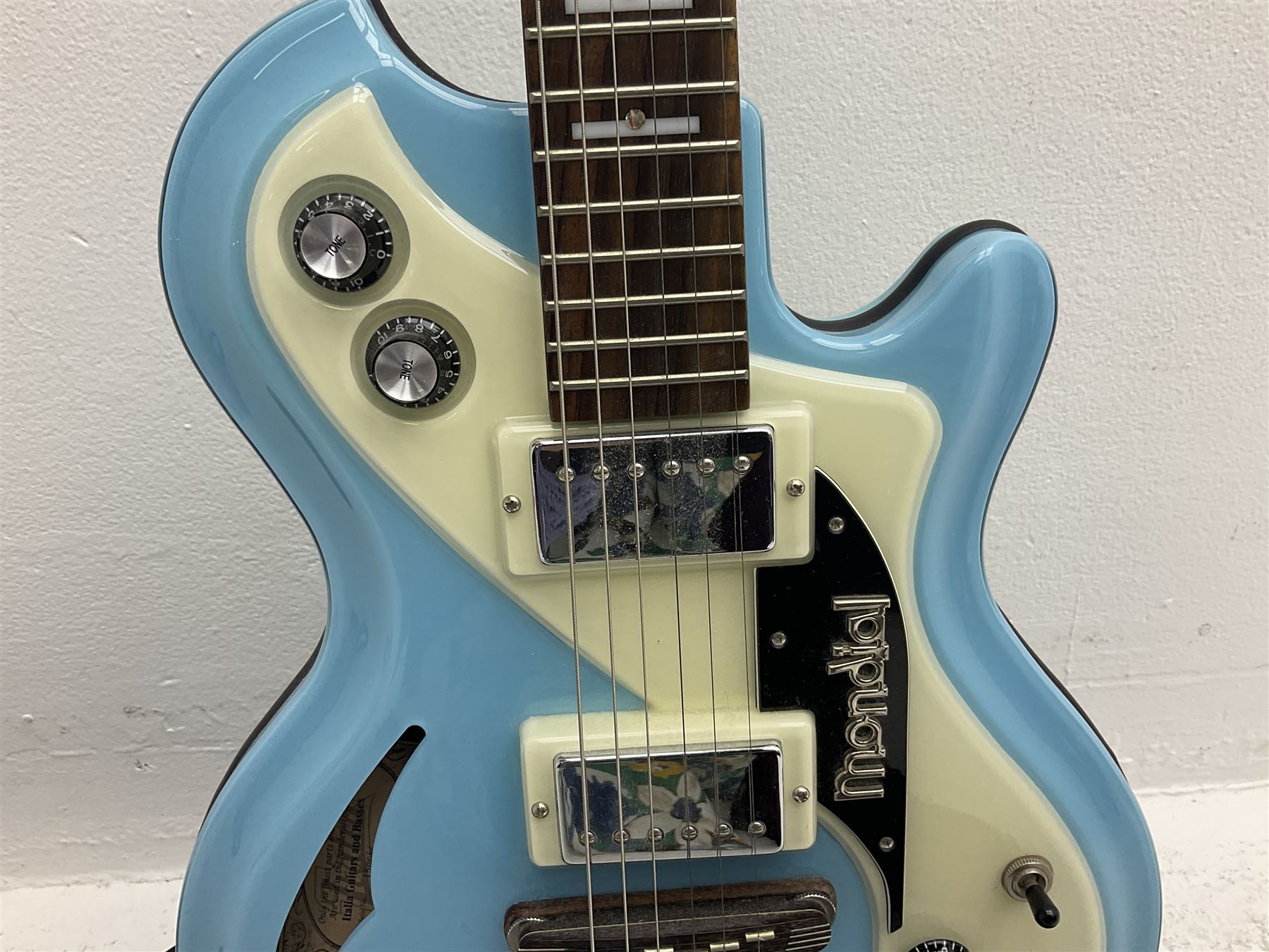 Italia Mondial electric guitar in blue with independent pick-ups, serial no.150066 L100cm; in original Italia carrying case 