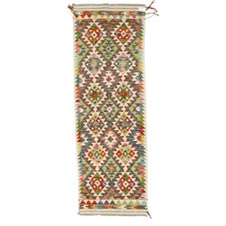Chobi kilim runner, flatwoven with repeating hooked diamond motifs in shades of red, green...