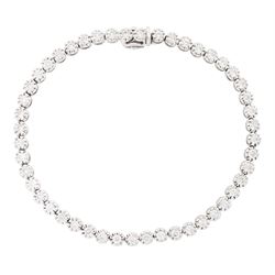 18ct white gold diamond bracelet, forty-eight round brilliant cut diamonds, in a bead setting, stamped 750, total diamond weight approx 2.50 carat