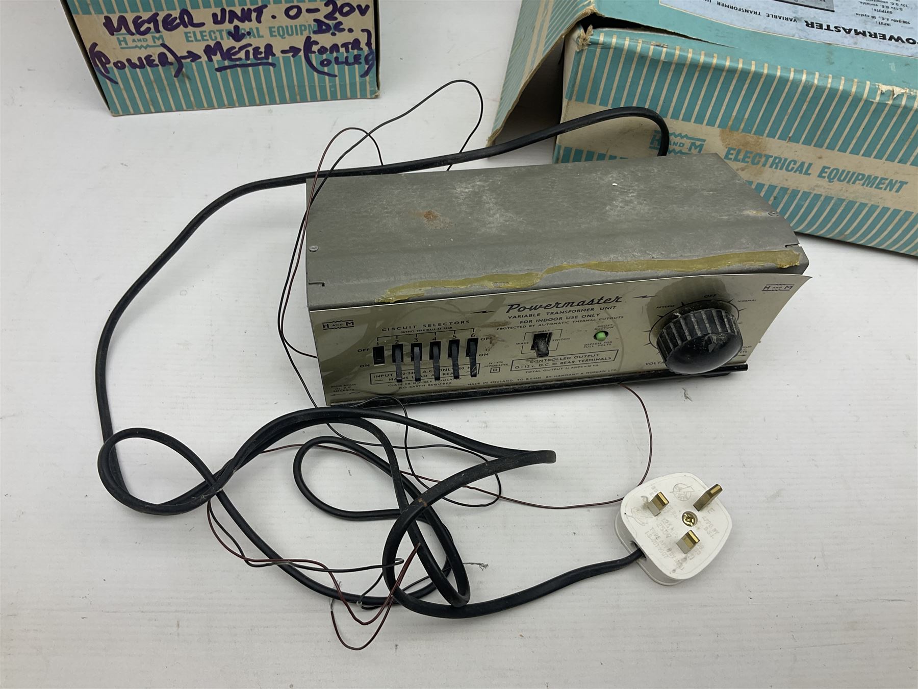 Quantity of loose unused 'N' gauge track; H. & M. Powermaster Variable Transformer Unit, Model R.C.1 Rectifier Controller, Selector Switch Unit and Meter Unit; all boxed; and small quantity of booklets