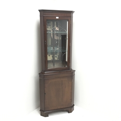 20th century mahogany corner display cabinet, single glazed door enclosing two shelves above single cupboard door, W67cm, H181cm, D42cm