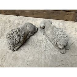 Pair of small cast stone sleeping Trafalgar Lions