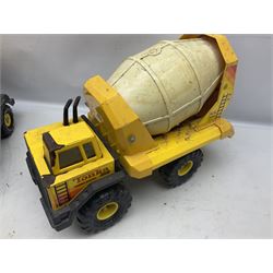 Tonka - five large scale pressed steel vehicles comprising Cement Mixer, Mobile Crane, Bulldozer and two Dumper Trucks (5)
