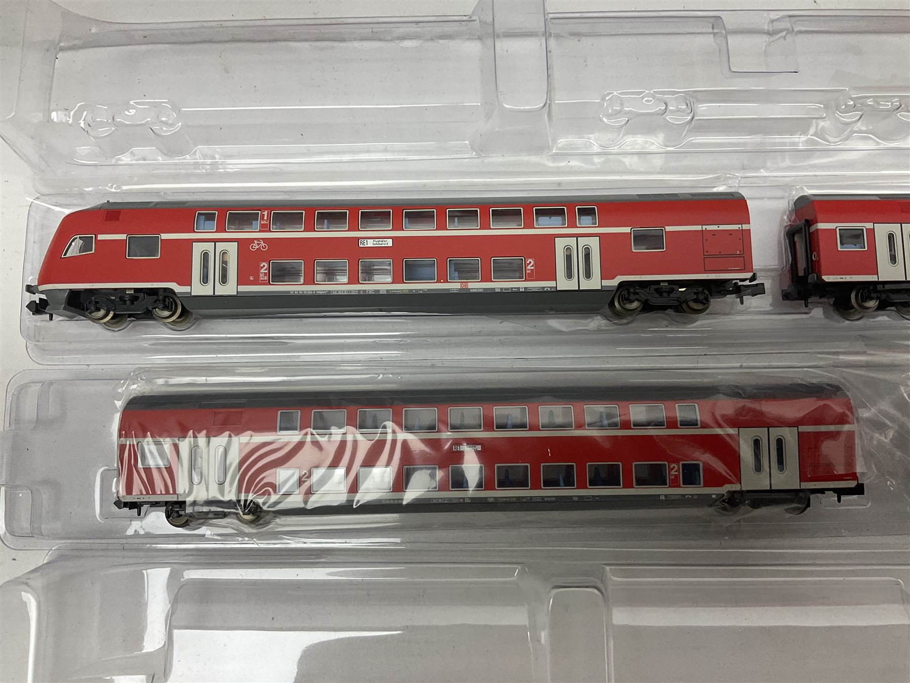 Fleischmann 'N' gauge - four-car set with double pantograph locomotive, dummy and two double decker coaches; No.825201 'Piccolo' three-piece wagon set; No.9198 'Piccolo' level crossing; No.9171 'Piccolo' points; and  No.KN35 Girder Bridge; all boxed