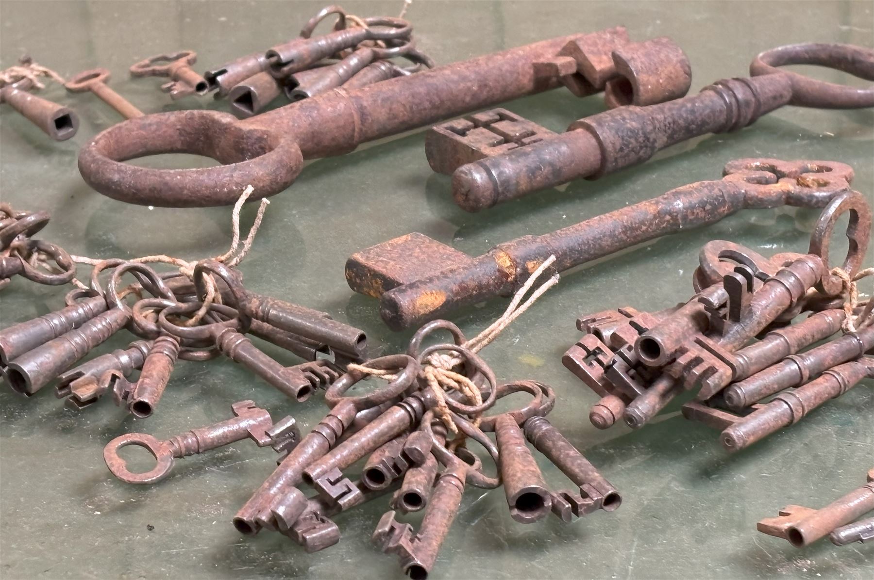 Collection of antique keys, including two large examples. Largest L21cm - COLLECTION BY APPOINTMENT FROM: The White House, Thirsk Road, Easingwold, York, YO61 3NF - CALL 01723 507111 TO ARRANGE