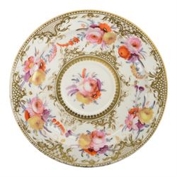 Coalport teawares, circa 1820-1840, comprising set of four trios, coffee cups, teacups and saucers, and slop bowl, decorated in the 830 pattern, with floral sprays and gilt shaped reserves, two further coffee cups and saucers, decorated with floral sprays upon blue grounds/with blue borders, and a similar coffee cup