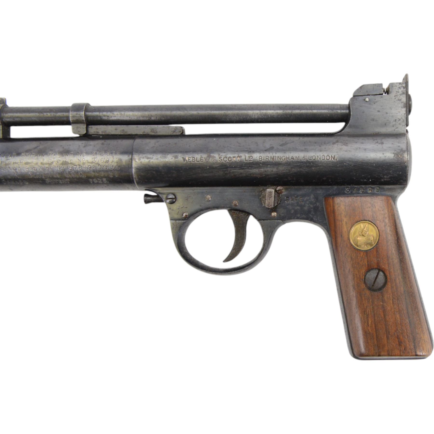 Webley Mark I .177 air pistol, circa 1924, serial number 34599, the air chamber marked Webley Air Pistol Mark I, Webley & Scott Ltd. Birmingham & London, with logo inset to the wooden grips, H13cm, L20cm