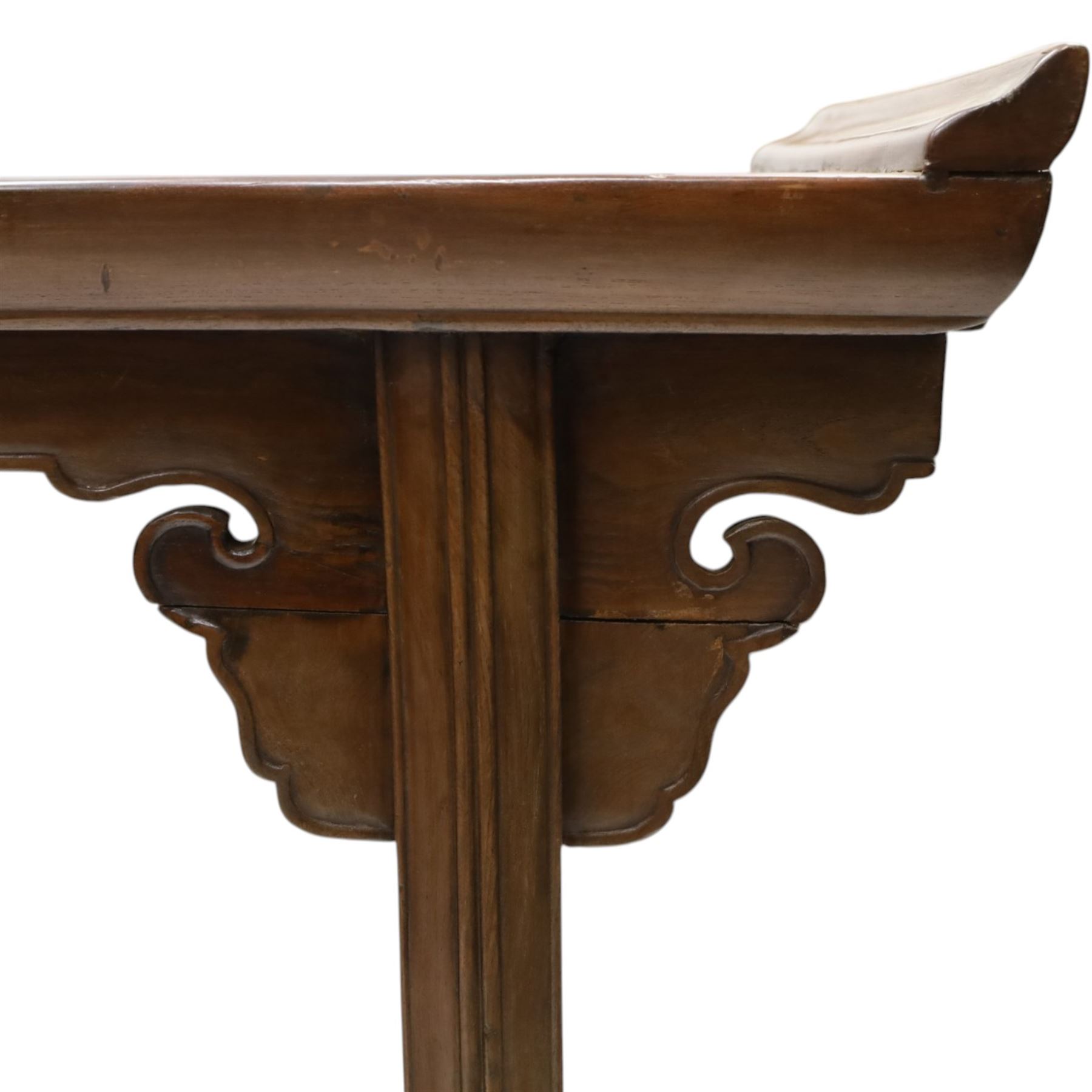Chinese elm altar table, rectangular plank top with galleried sides, raised on reeded square supports with scrolled spandrels