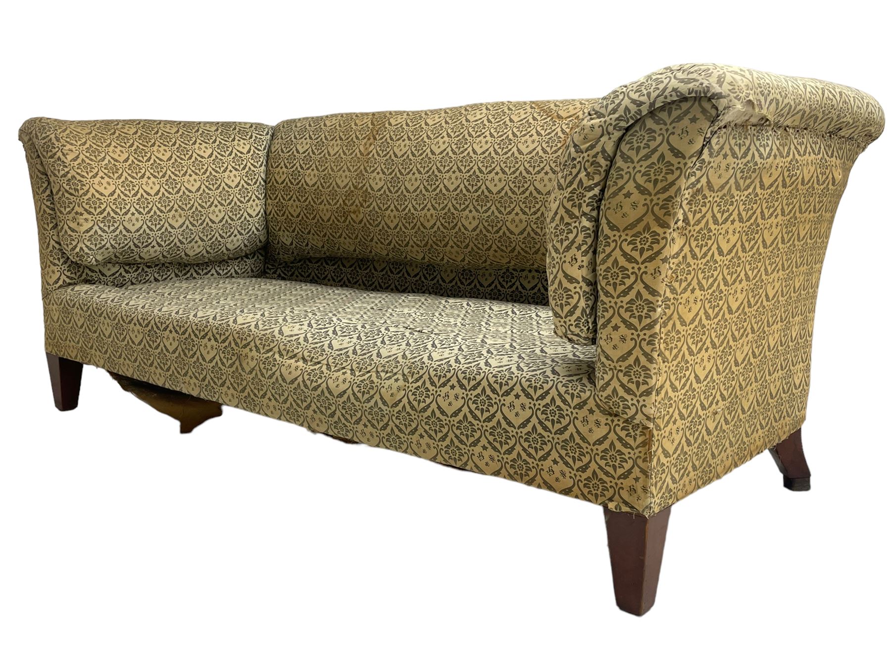 Howard & Sons - Edwardian mahogany framed two seat sofa, upholstered in original H&S foliate patterned fabric with sprung seat and overstuffed back and arms, raised on square tapering supports, the rear leg stamped '19600 1795 Howard & Sons Ltd Berners Street'