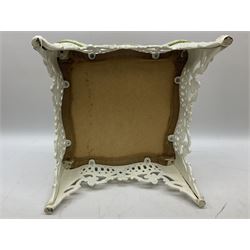 Victorian style cast iron stool, the white painted base of pierced scrolling form, the floral woolwork cushion top, H25cm D34cm