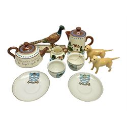 Beswick pheasant, no 1774, together with two Beswick dogs, W.H. Goss Beverley crested ware teacups and Royal Watoombe Torquay motto ware Land's End three piece miniature tea service