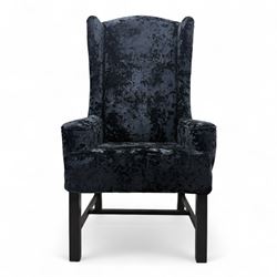Oka - Pair of contemporary upholstered wingback armchairs, in black and blue textured velvet effect fabric, with tall scroll wing sides and square tapered legs joined by stretchers