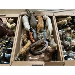 Three boxes of animal figures to include mainly ceramic and composite examples, to include dogs, horses, big cats etc