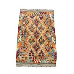 Choli Kilim beige ground rug, multi coloured patterned field